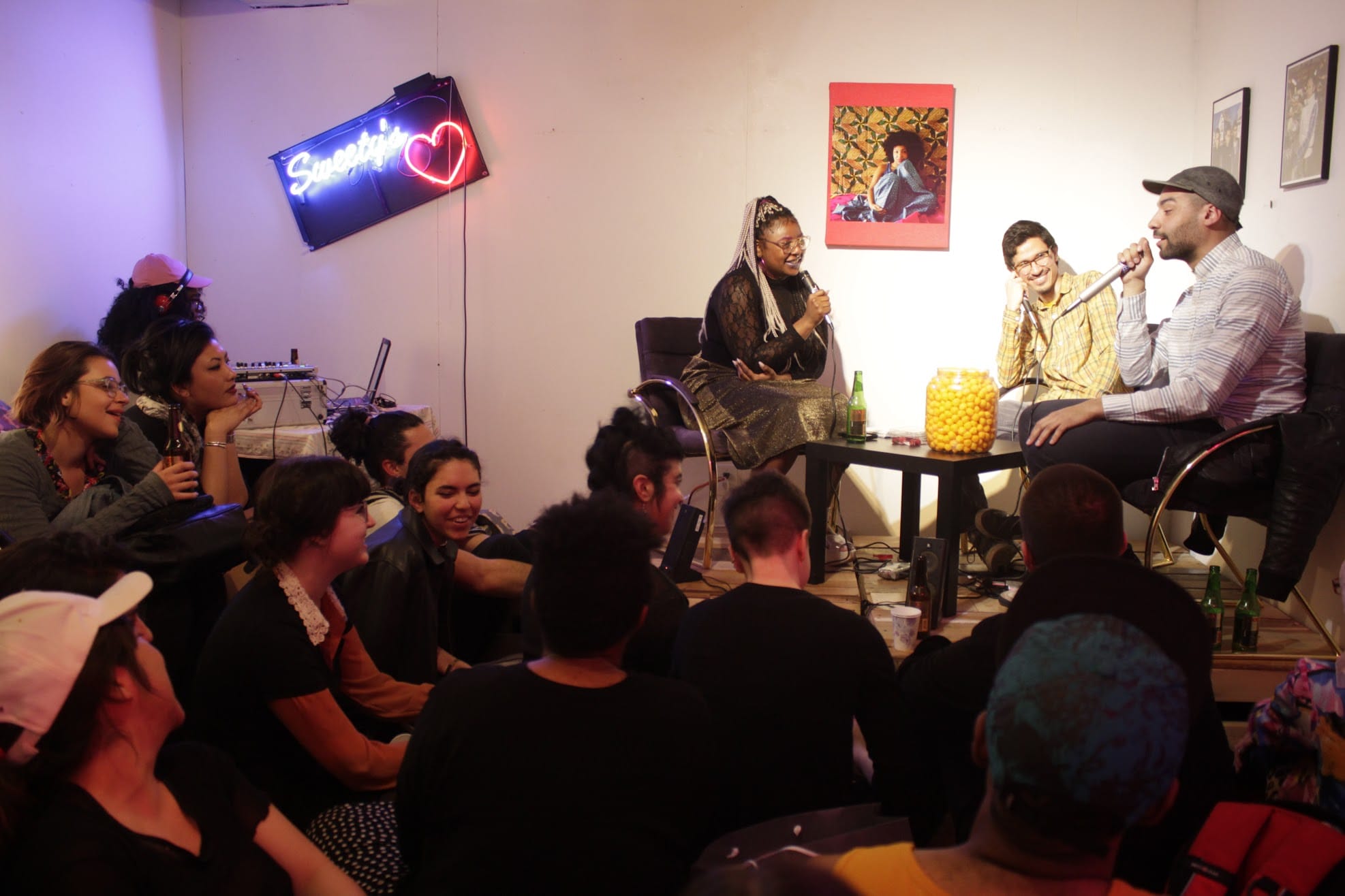 The hosts interview guest in front of live audeince