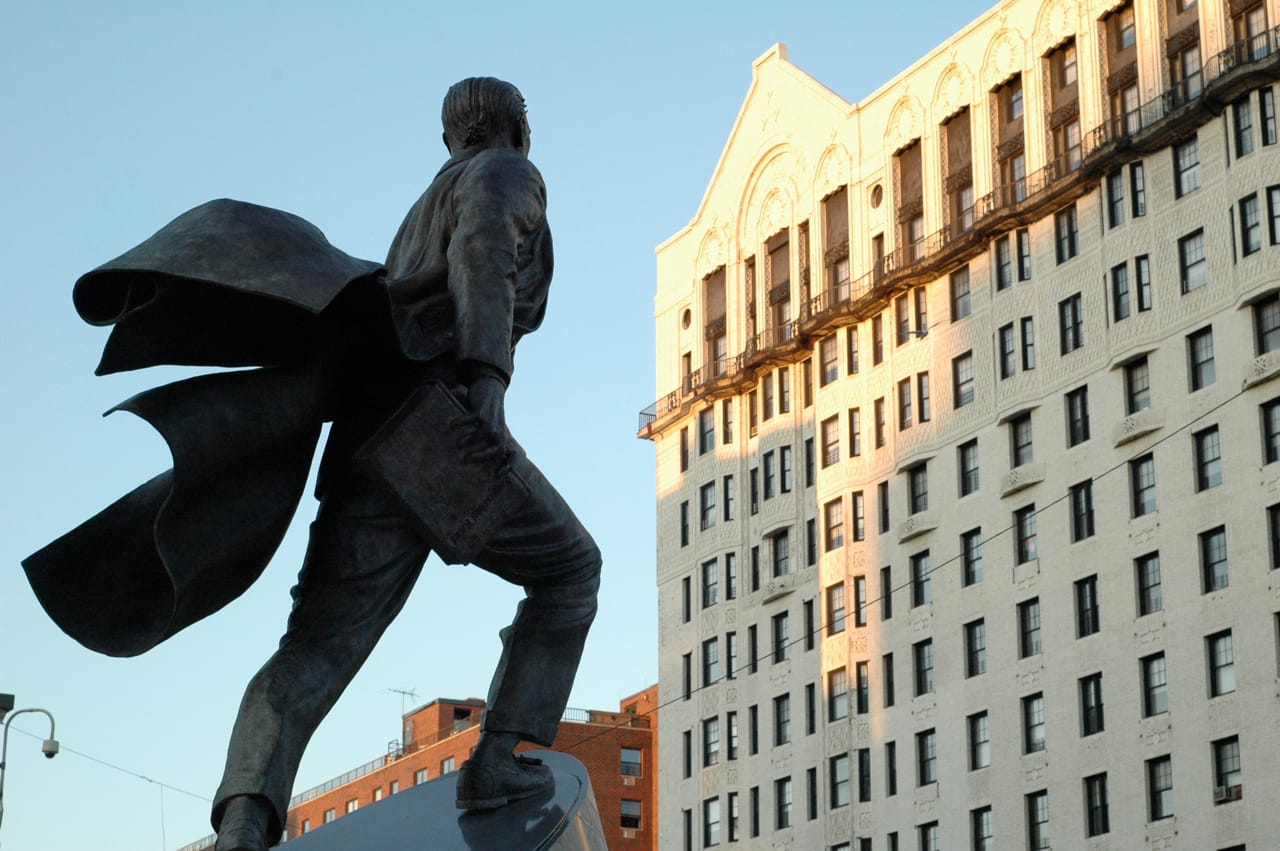Bronze public art statue of Adam Clayton Powell, Jr at Harlem's 125th Street. Photo by David Goehring via Flickr.