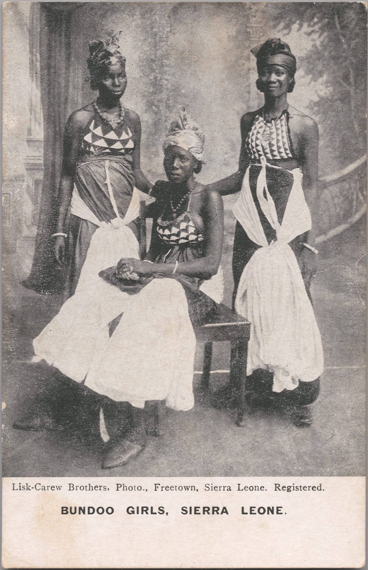 Unknown Artist [possibly Alphonso Lisk-Carew, Sierra Leonean, 1887-1969] Bundoo Girls – Sierra Leone, ca. 1905-1925 Photomechanical reproduction published by Lisk-Carew Brothers 5 x 3 in (13.3 x 8.3 cm) Visual Resource Archives, Department of the Arts of Africa, Oceania, and the Americas