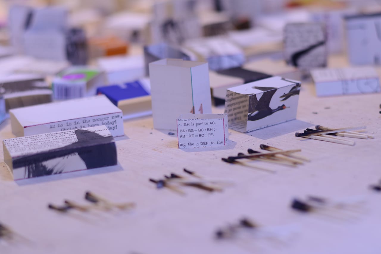 Artist Issam Kourbaj at St. Paul's Chapel and with his installation, Another Day Lost, in Trinity Church's south churchyard.