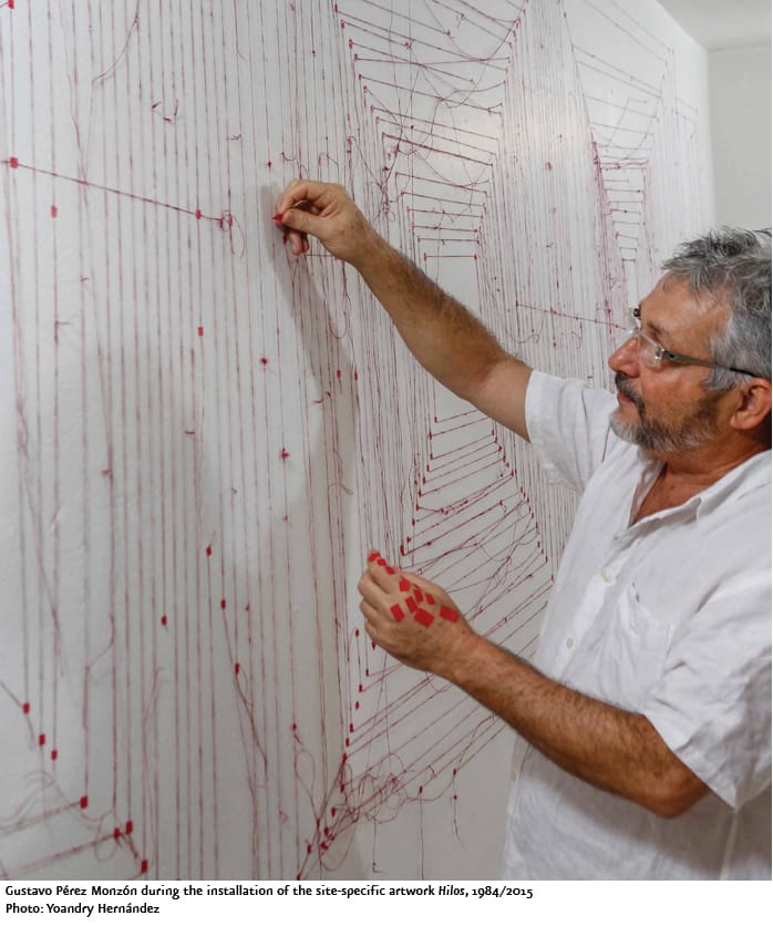 Gustavo Pérez Monzón installing a site-specific work (photo Yoandry Hernandez, via Cifo)