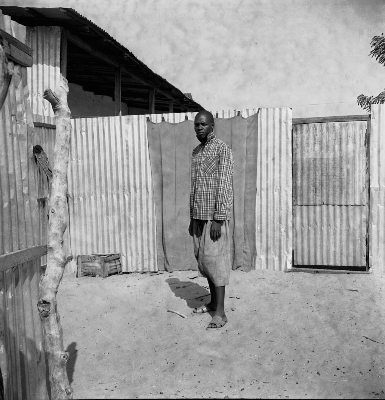 Oumar Ka (Senegalese, b. 1930) Man Standing in a Courtyard, 1959-1968 Inkjet print, 2015 Visual Resource Archive, Department of the Arts of Africa, Oceania, and the Americas