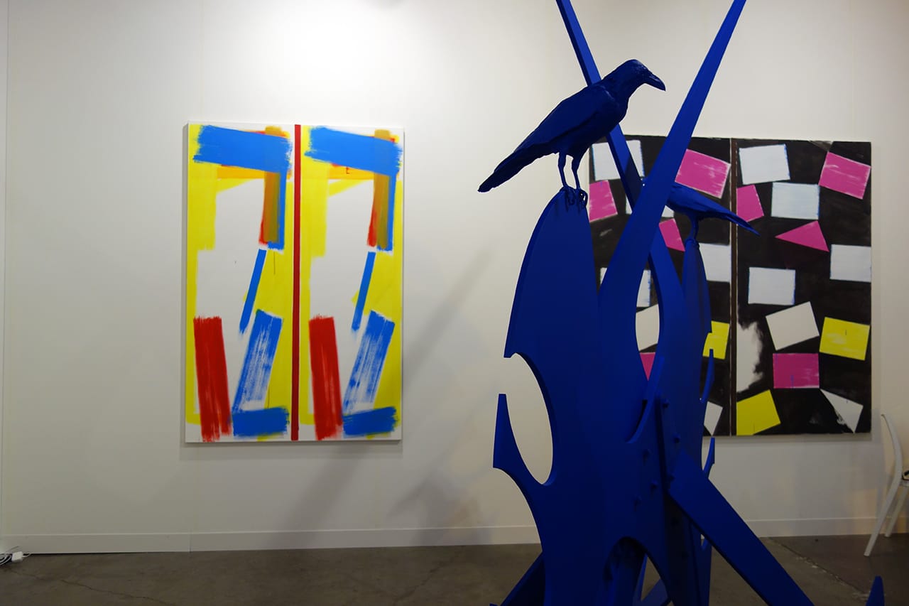 Installation view of art sculpture by Nathan Mabry and painting by Bernard Piffaretti with Cherry and Martin