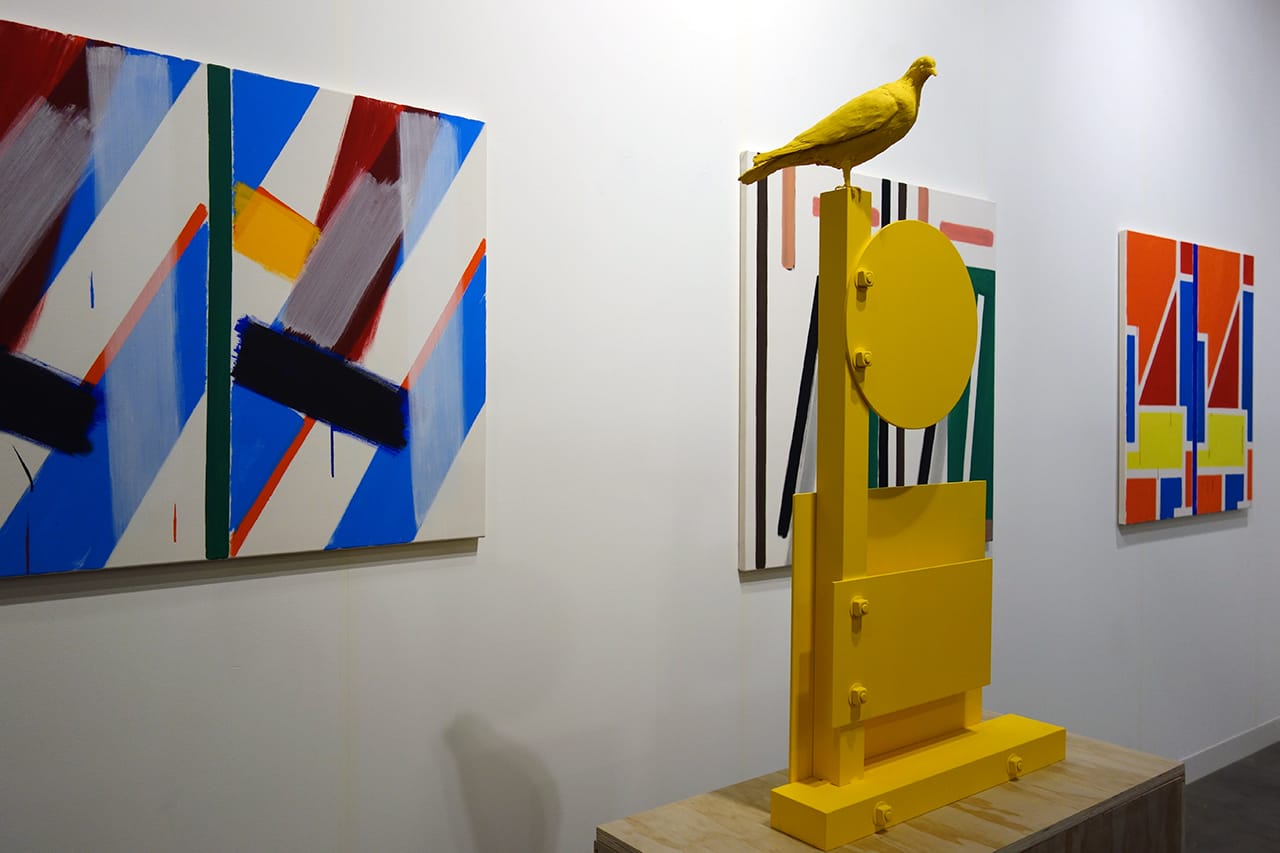 Installation view of art sculpture by Nathan Mabry and painting by Bernard Piffaretti with Cherry and Martin
