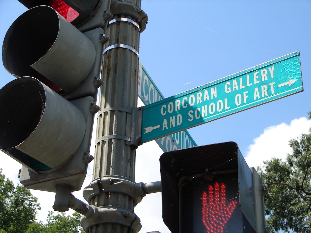 A sign pointing to the location of the old Corcoran Gallery and School of Art building. (photo by J B/Flickr)