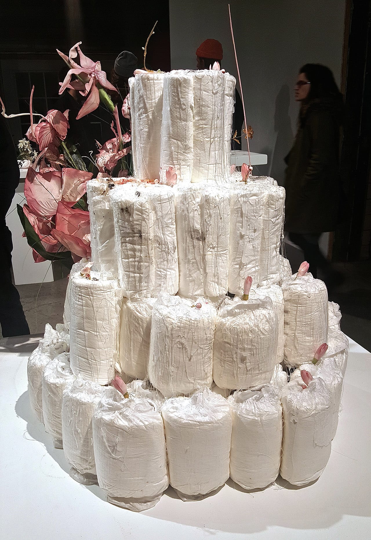 "Diaper Cake" (2015), diapers, hot glue, candies, glitter, dirt, fake flowers (click to enlarge)