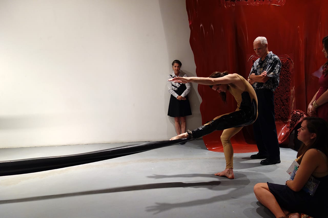 Silas Riener performing with Martha Friedman's 'Pore' at Locust Projects