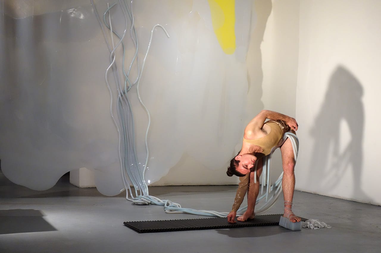 Silas Riener performing with Martha Friedman's 'Pore' at Locust Projects