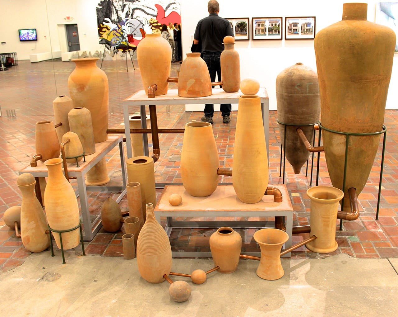 A series of connected terra cotta pots into a kind of alchemical "works" by Ximeno Garrida-Lecca. (all photos by the author for Hyperallergic)