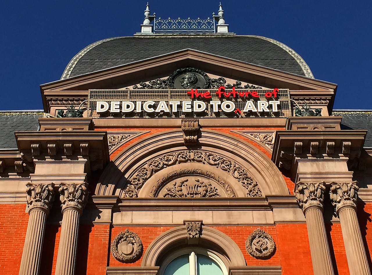 New signs on the façade of the Smithsonian's Renwick Gallery have irked preservationists. (photo by Ron Cogswell/Flickr)