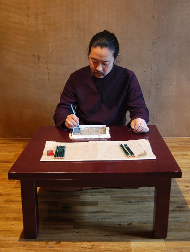 Zhou Bin performing 'Puzzling Tracks' (2014) (all images courtesy the artist)