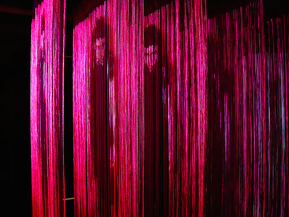 YOU BELONG TO ME 2015 Audio/video installation 1 projector and 5 rows of pink fringe in a wooden or steel frame suspended from the ceiling 6' x 3' x 8', 6:30 looped