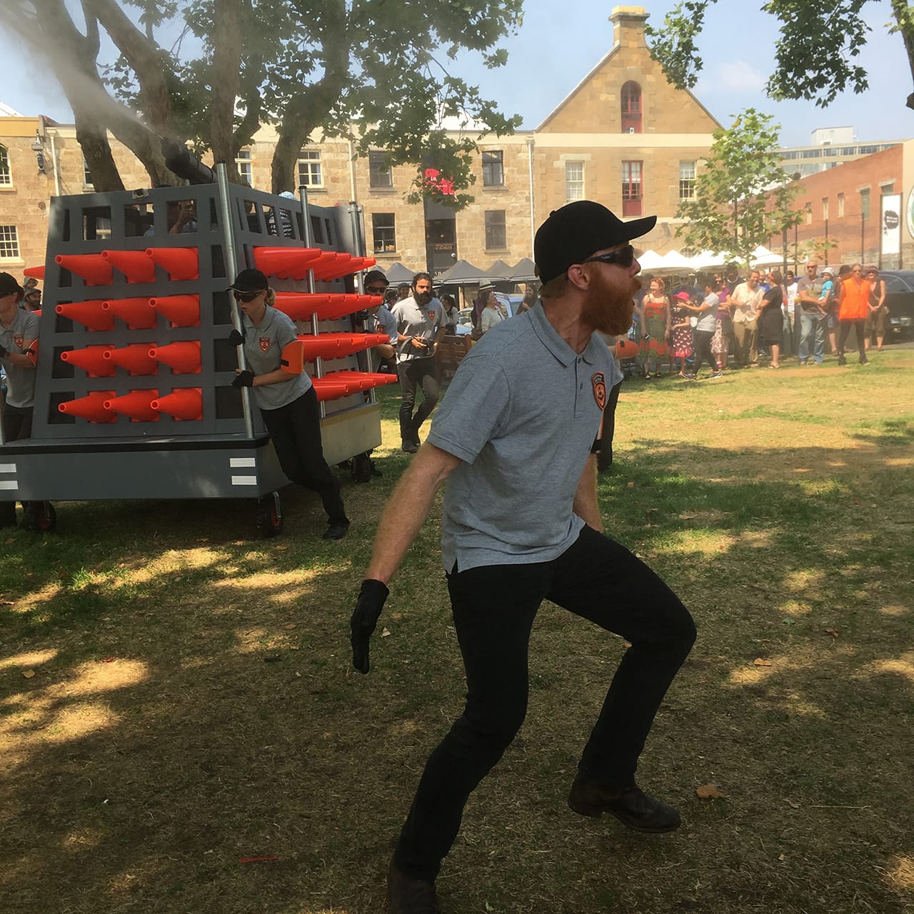 A guard yells, "Move!"