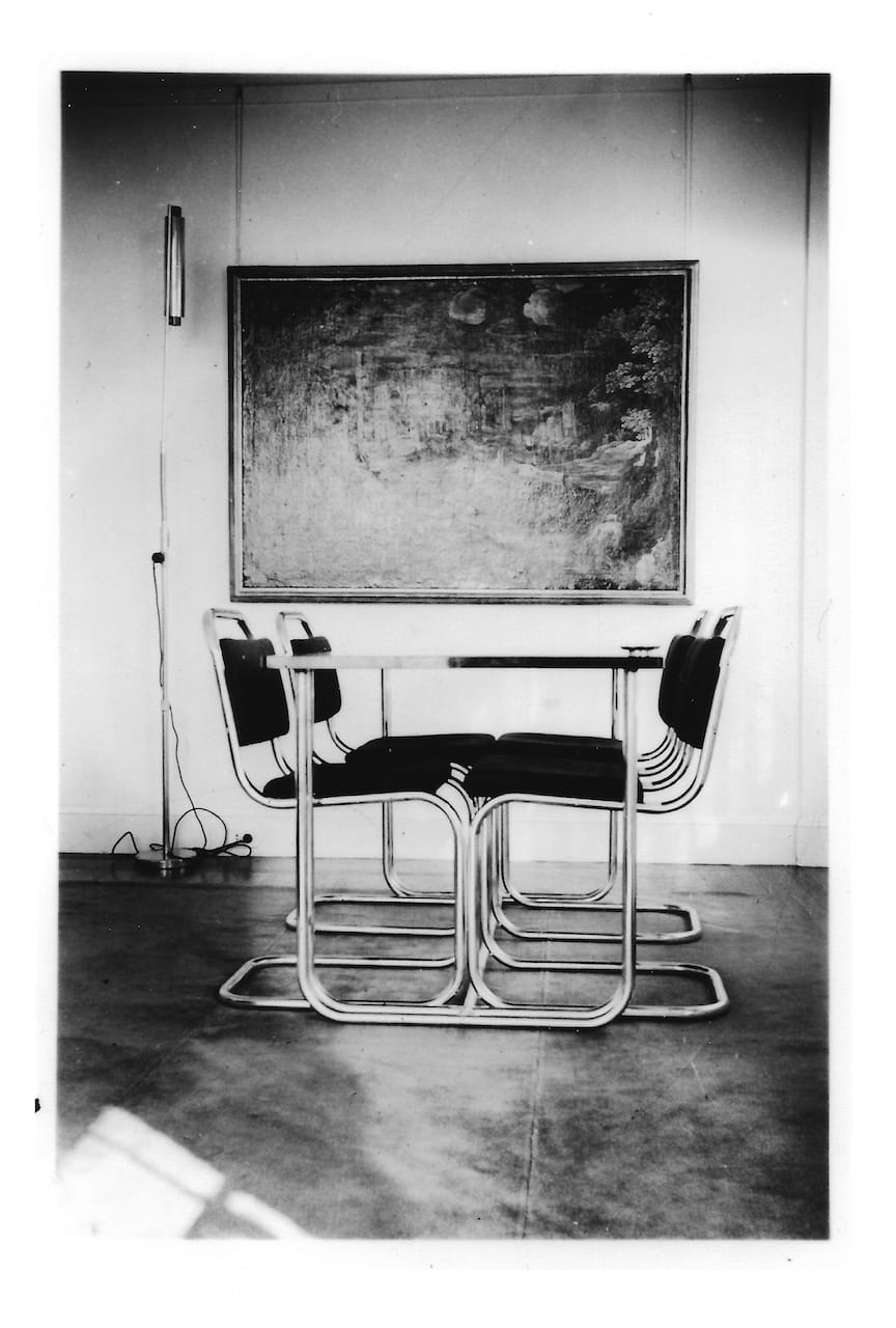 Donald Deskey table and chairs in front of Coliseum at Night, with Halle Werkstatte lamp at left. Barr apartment, Two Beekman Place, c. 1934.