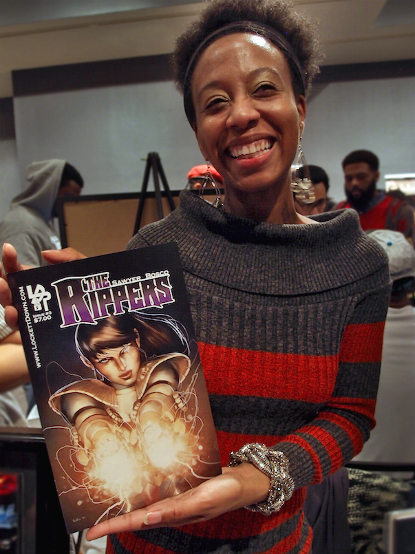 Regina Sawyer shows off her comic (click to enlarge)