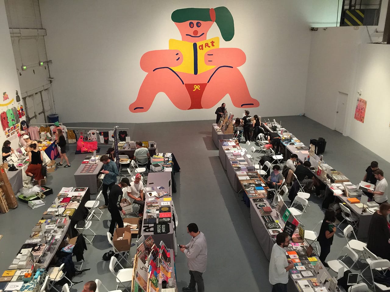 A mural by dominates one of the many sections of the 2016 LA Art Book Fair (all photos by the author for Hyperallergic)