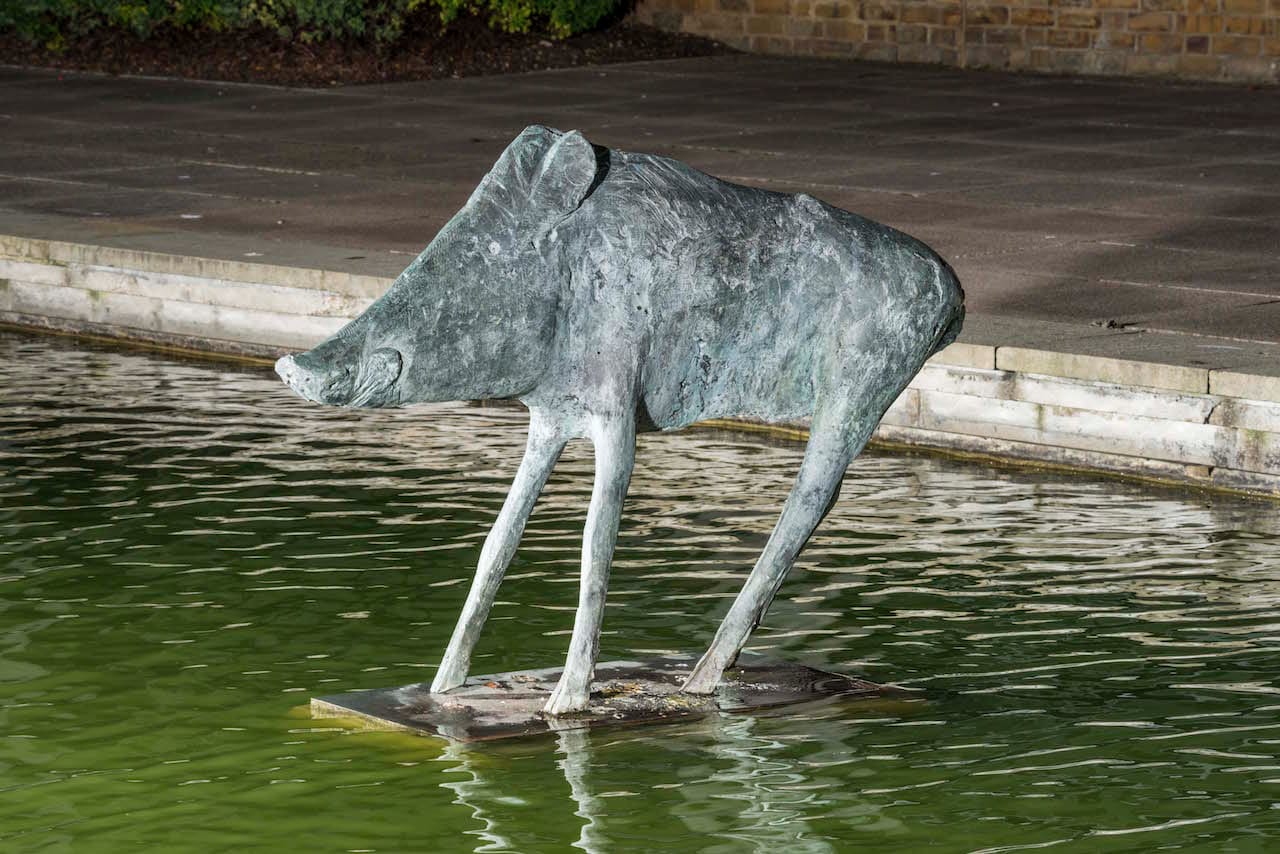 Post War Public Art. Boar (1970) by Elisabeth Frink, The Water Gardens, Harlow, Essex. Detail view from the south east.