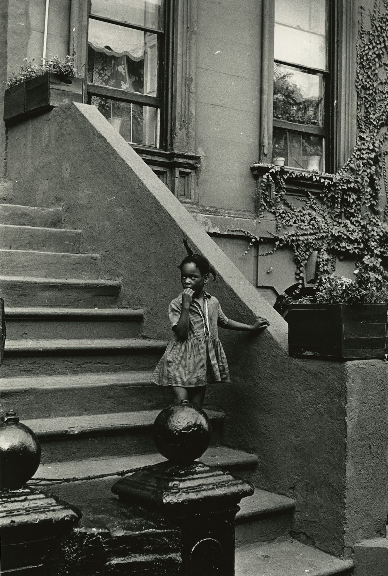 Louis Draper, "Untitled (Girl on steps, building with ivy)" (c. 1965), vintage gelatin silver print, printed c. 1965 14 x 11 inches
