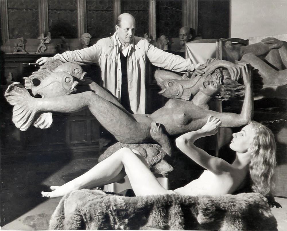 Arthur Fleischmann, Miranda, 1951. Image of the artist in the studio with the work and model. Reproduced with kind permission from the Arthur Fleischmann Archive.