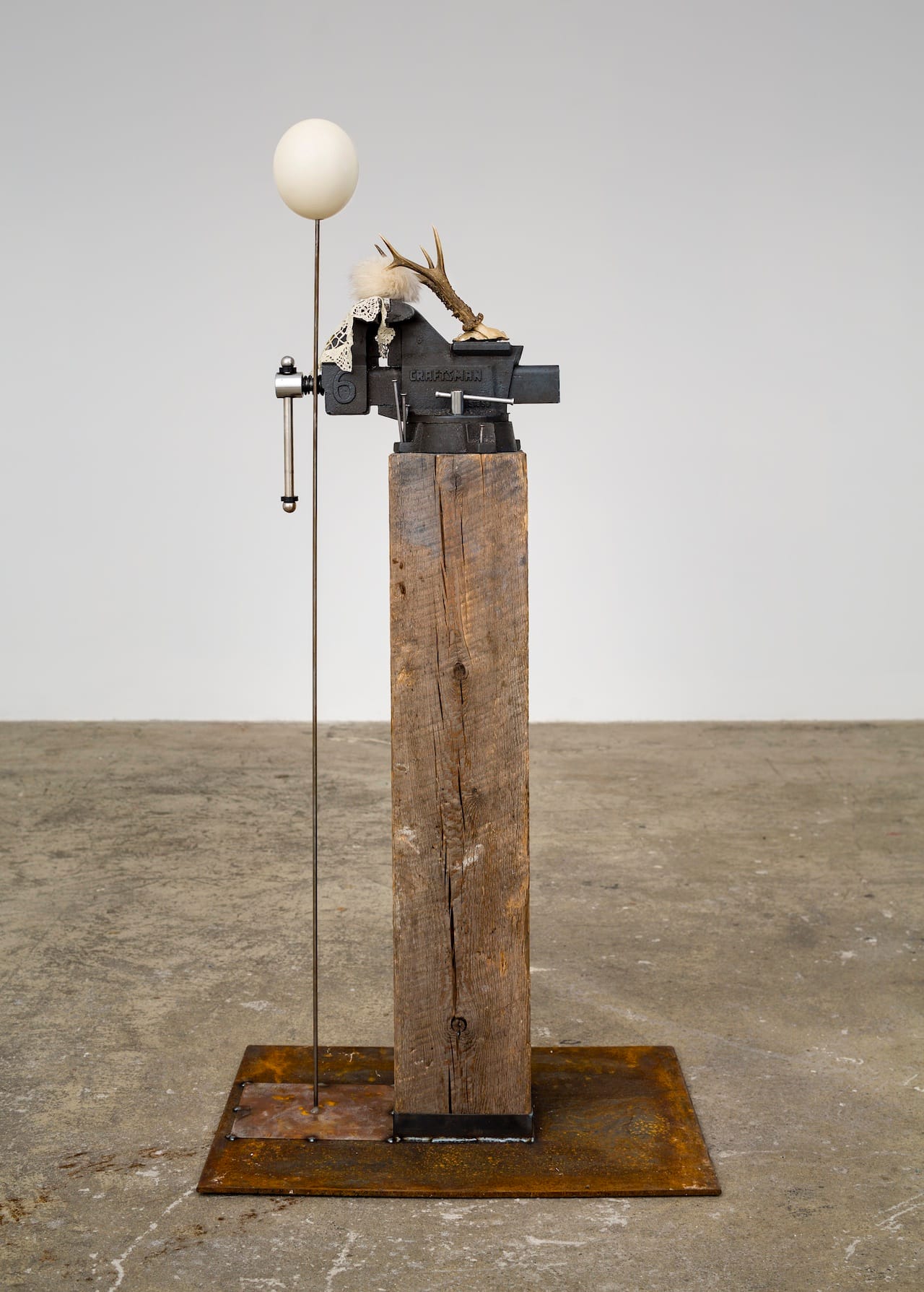 Ektor Garcia, "Mariposa" (2015), deer antlers, fur, lace, ostrich egg, steel, wood, craftsman vice, nails, 58 x 21 x 28 inches (click to enlarge)