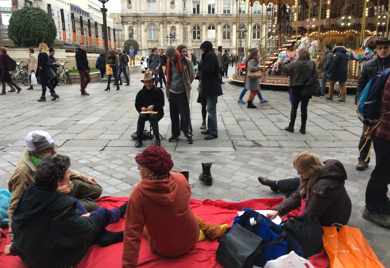 Members of the Collectif des Modèles d’Art de Paris stage a life drawing session in the Place de l'Hôtel de Ville.