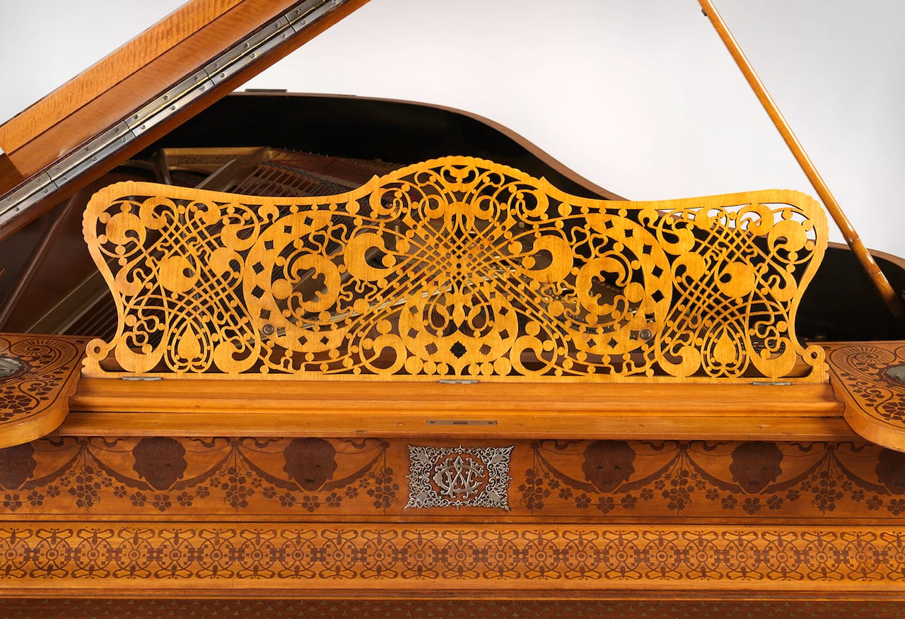 Detail of Model B grand piano, case by George A. Schastey & Co., piano by Steinway & Sons, New York City (1882), satinwood, purpleheart, brass, and silver mounts (collection of Paul Manganaro, courtesy Metropolitan Museum of Art)