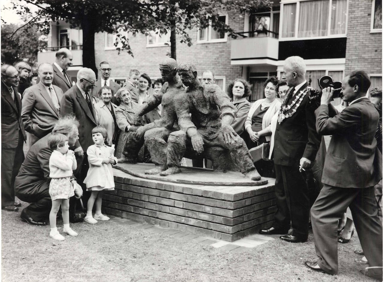 Unveiling day for Siegfried Charoux’s The Neighbours, Highbury Quadrant Estate, 1959, London. In 1956 the London County Council set up the Patronage of the Arts Scheme, where money was set aside each year to purchase such works of art.
