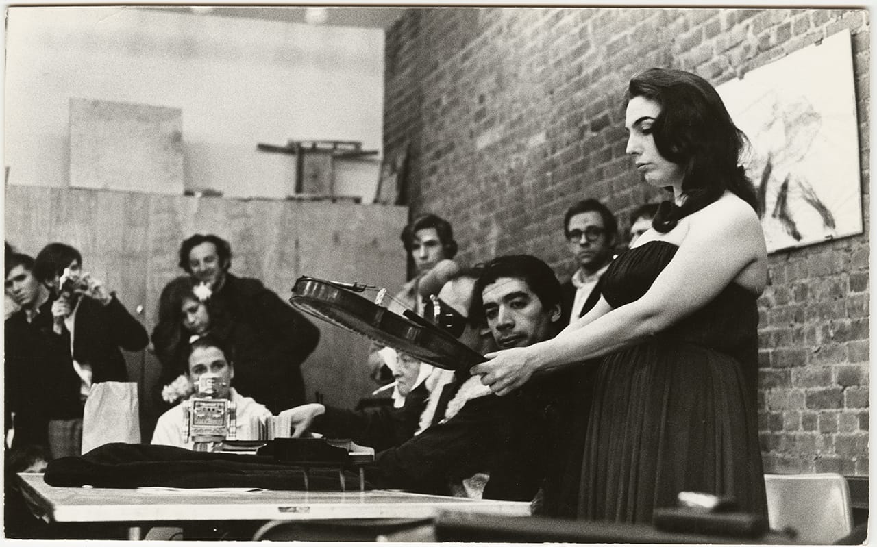 Charlotte Moorman performs Nam June Paik’s "One for Violin Solo" DIAS—USA—Preview, New York City, March 22, 1968 (© Julie Abeles, courtesy Charlotte Moorman Archive, Charles Deering McCormick Library of Special Collections, Northwestern University Library) (click to enlarge)