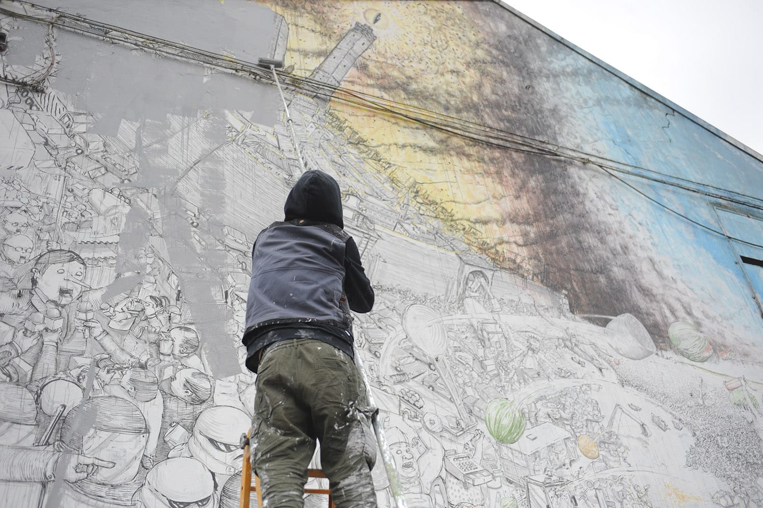 Blu erases a mural in Bologna (image via Blu)