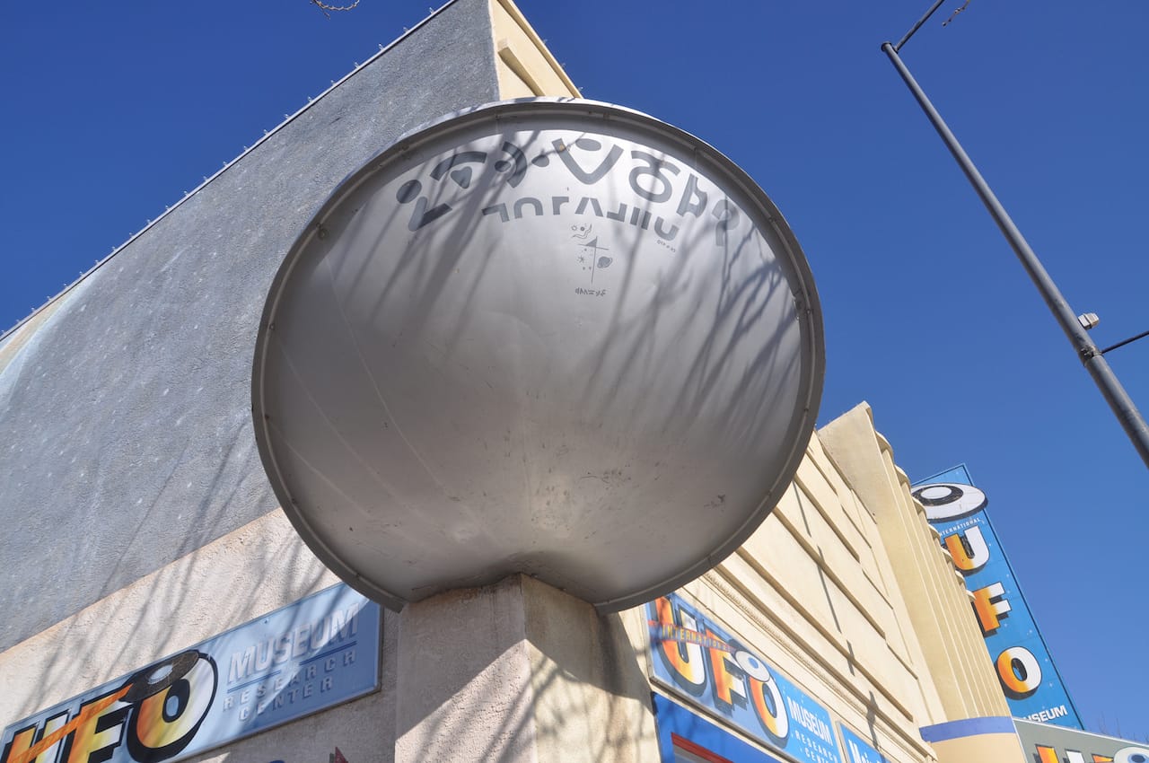 This flying saucer sculpture on the exterior of the International UFO Museum and Research Center was recently stolen and smashed. (photo by Tiffany LeMaistre/Flickr)