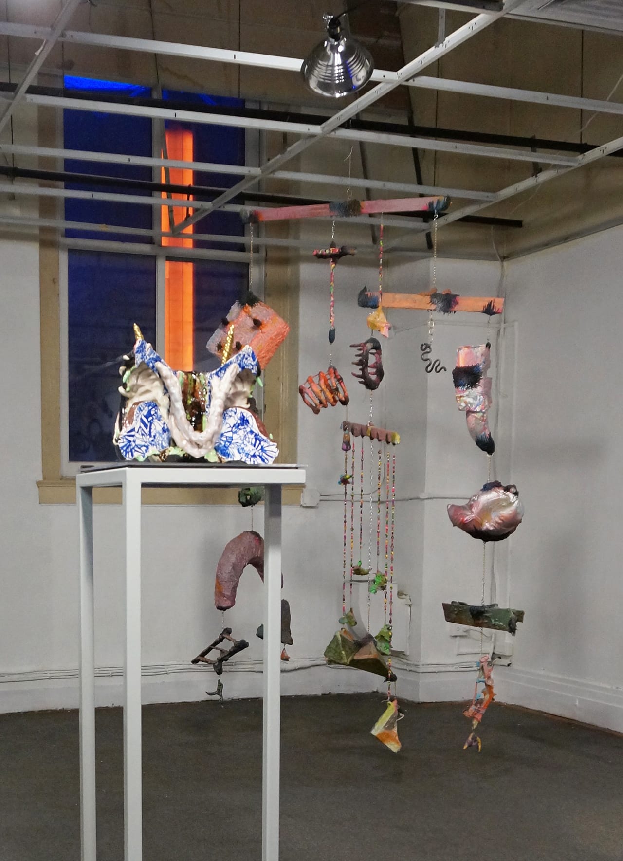 Installation view of Rachel Phillips’s 'Knife Hits,' with work by Roxanne Jackson in foreground and Ben Pederson in back