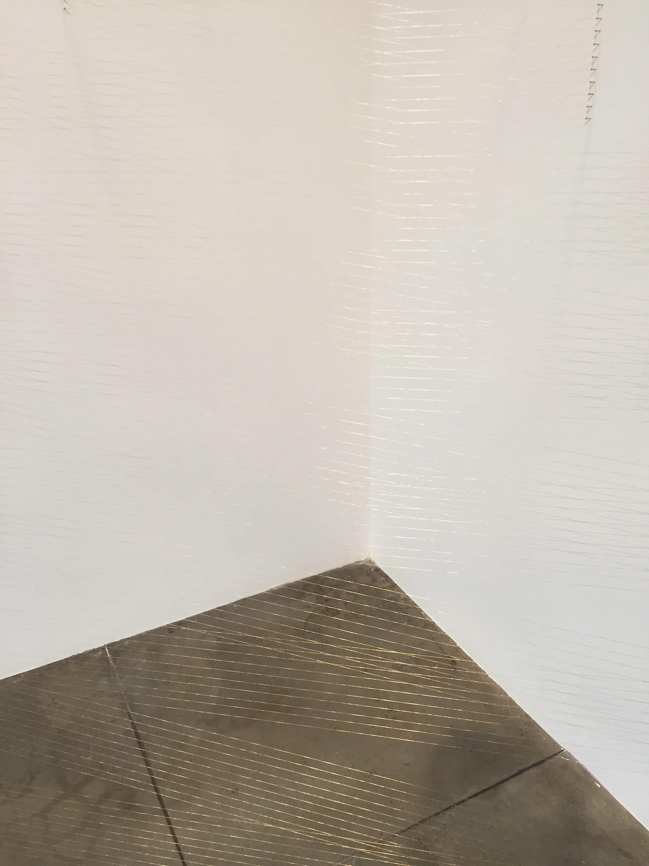 Lygia Pape, "Ttélia 1, A" (1978/1997/1999), golden thread, nails, light, 7 ft 6 1/2 in. x 10 ft 6 in. x 4 ft 11 in.