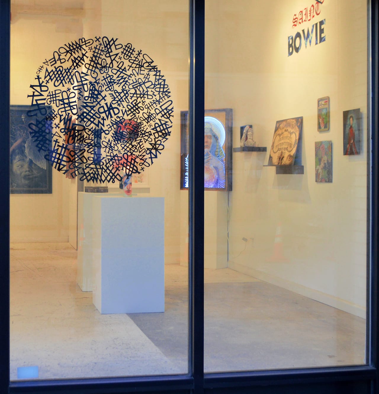 'Saint Bowie' installation view with Barry William Hale “BlackStar” (2016), cut vinyl on window