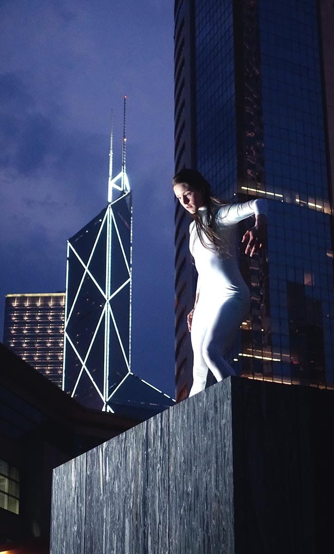 Shen Wei Dance Arts, "Untitled No.32 (Bodies and Rooftop)" (2016), with the Bank of China Tower in the background