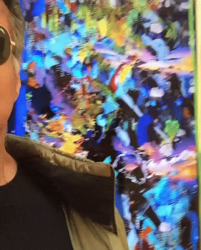 Sly discovering video, or "living" art at the Independent Art Fair (gif by the author via @fficialslystallone/Instagram)