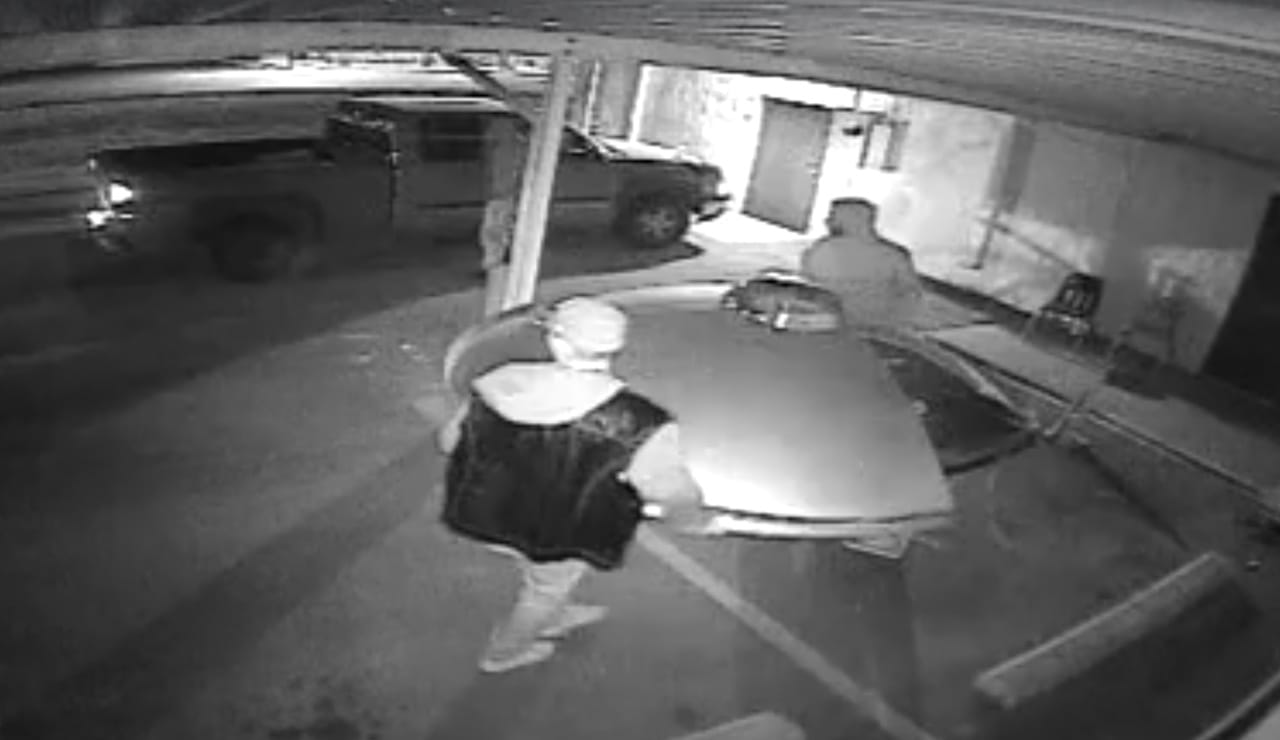 Still from security camera footage of the International UFO Museum and Research Center flying saucer heist (screenshot by the author via Facebook)