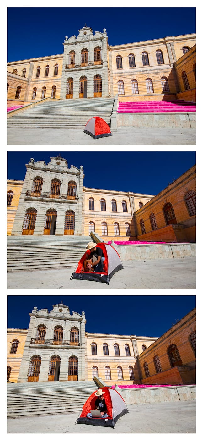 An artist-in-residence working on the front steps of the former mill that houses the Centro de las Artes de San Agustín