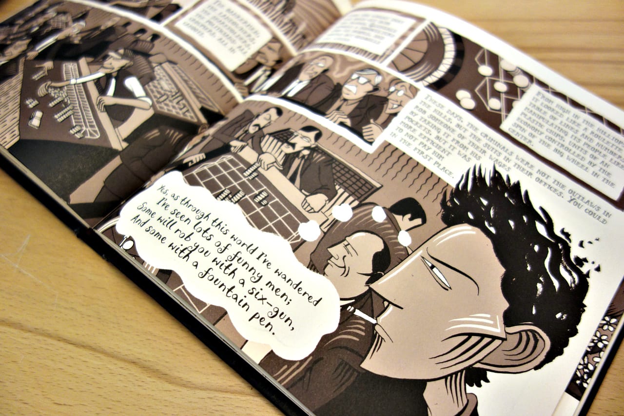 Pages from 'Woody Guthrie and the Dust Bowl Ballads' (photo of the book for Hyperallergic)