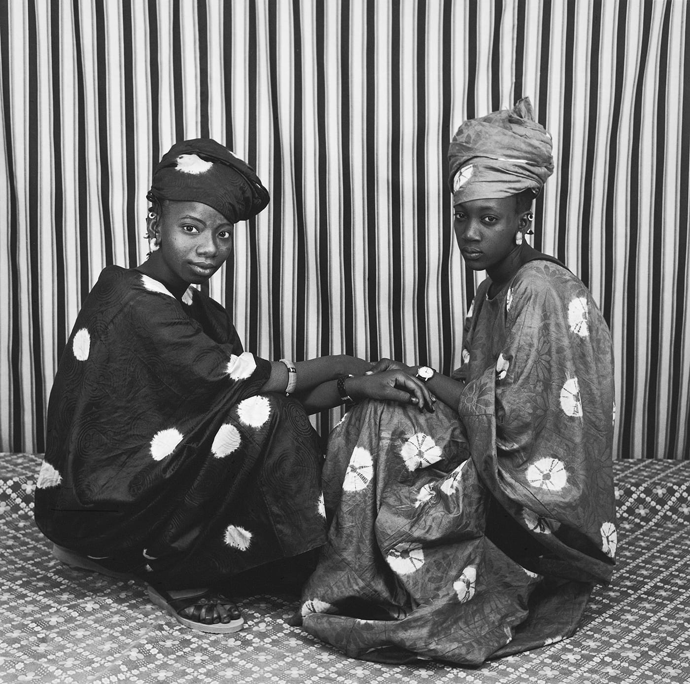 Malick Sidibé, "Deux amies Peulhs" (printed 2001 from earlier negative), silver gelatin print on board, 23 7/8 x 20 in paper size, 28 1/8 x 28 1/2 x 1 1/2 in framed (©Malick Sidibé, courtesy the artist and Jack Shainman Gallery, New York)