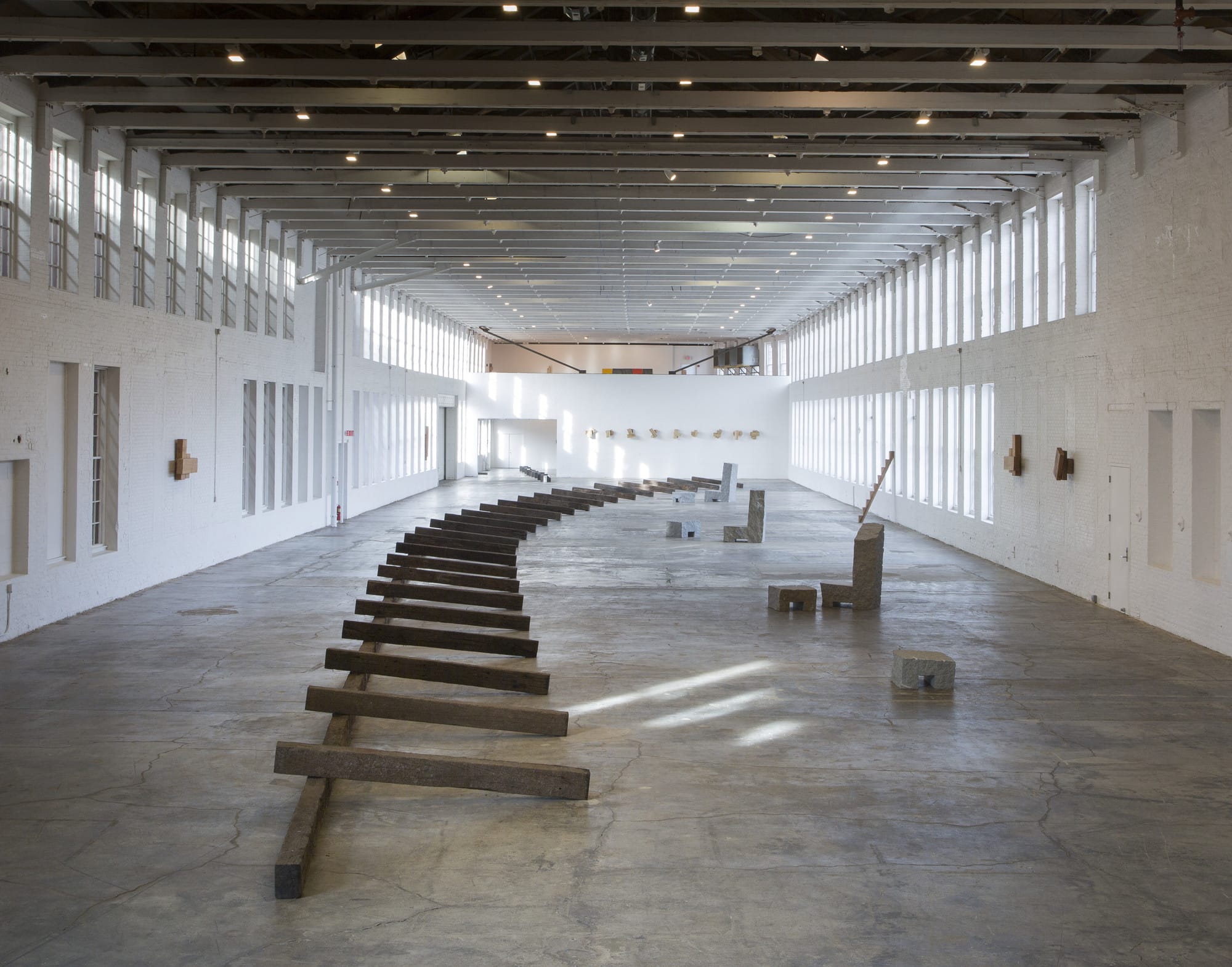 Richard Nonas, "The Man in the Empty Space," installation view, railroad ties, granite (photo byDavid Dashiell)