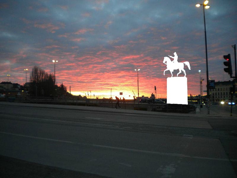 Sunset_over_Lake_Malar_with_1854_statue_of_Carl_XIV_John_of_Sweden_removed