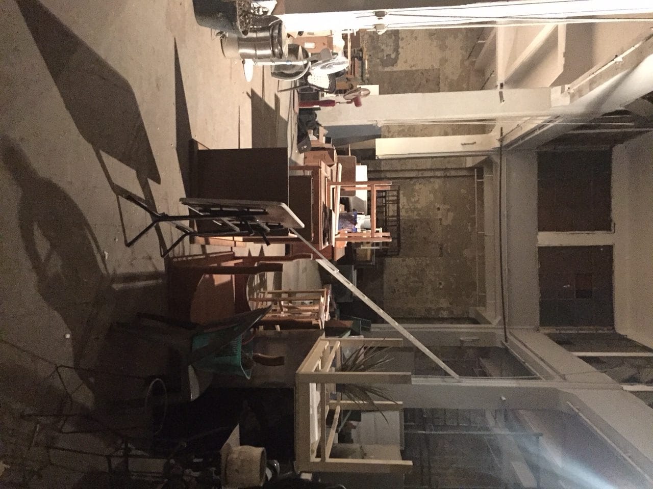 Townhouse Gallery's Factory space filled with furniture and objects evacuated from its main building