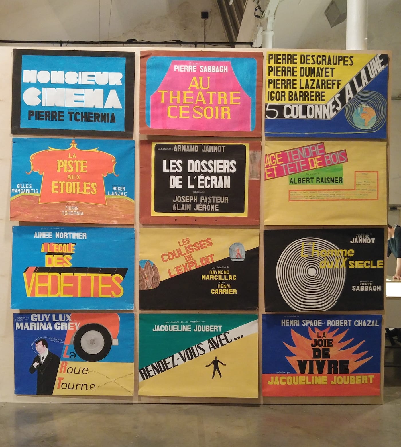 A selection of Guy Brunet's hand-painted film posters in 'Guy Brunet Réalisateur : Le Studio Paravision' at Lieu Unique