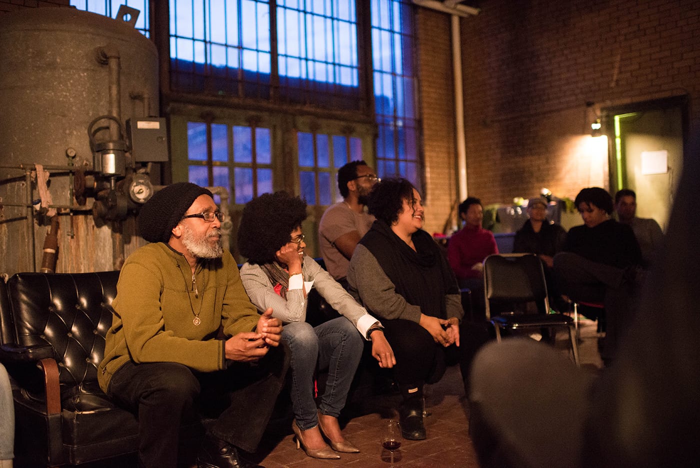 Malik Yakini (Detroit Black Community Food Security Network), Pashon Murray (Detroit Dirt), and Dream Hampton (writer) participate in post dinner panel on food justice in Detroit. (photo by Justin Millhouse) 