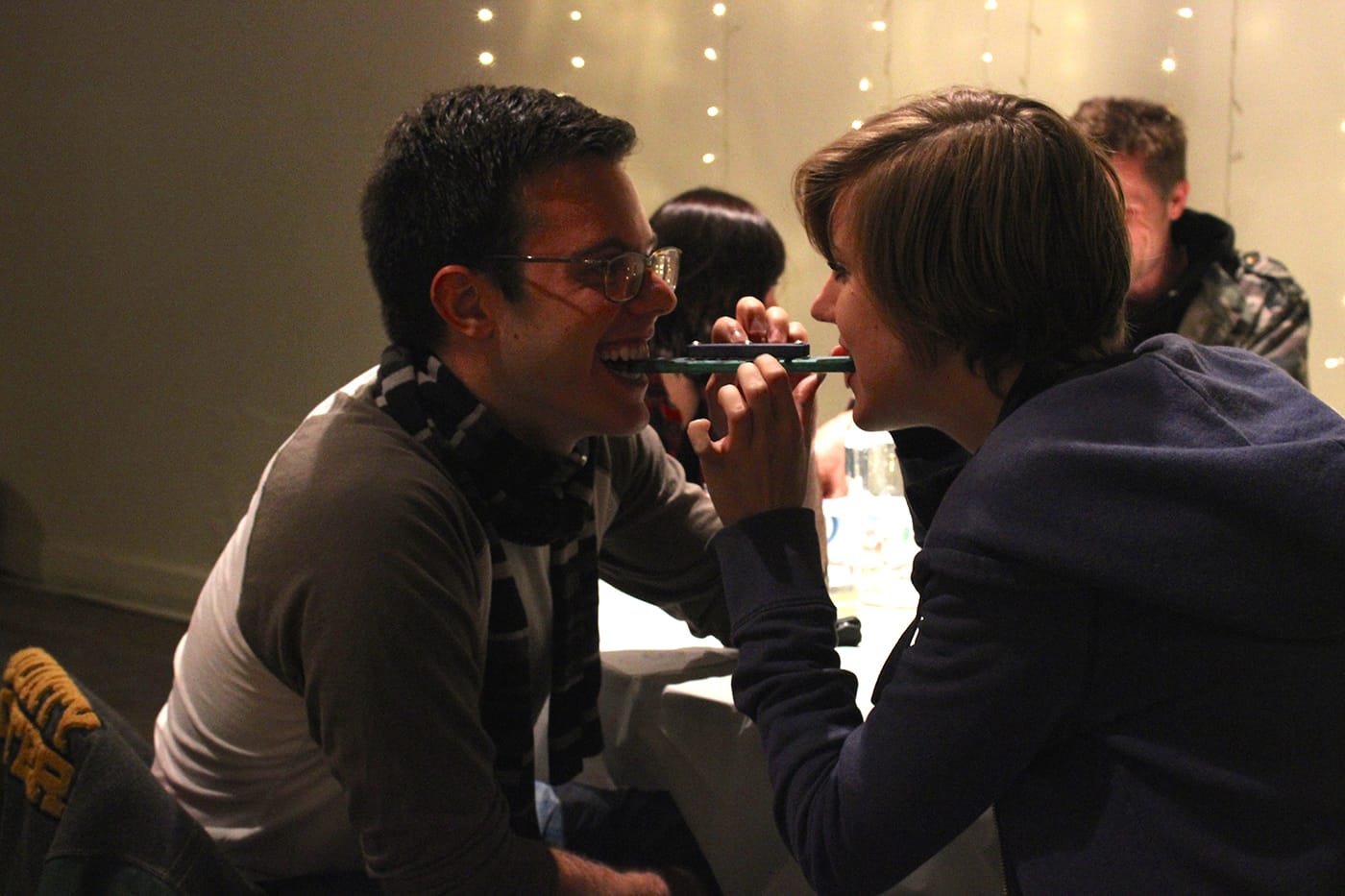 Participants in Chris Reilly's 'Intimate Instruments Workshop' test out their final product.