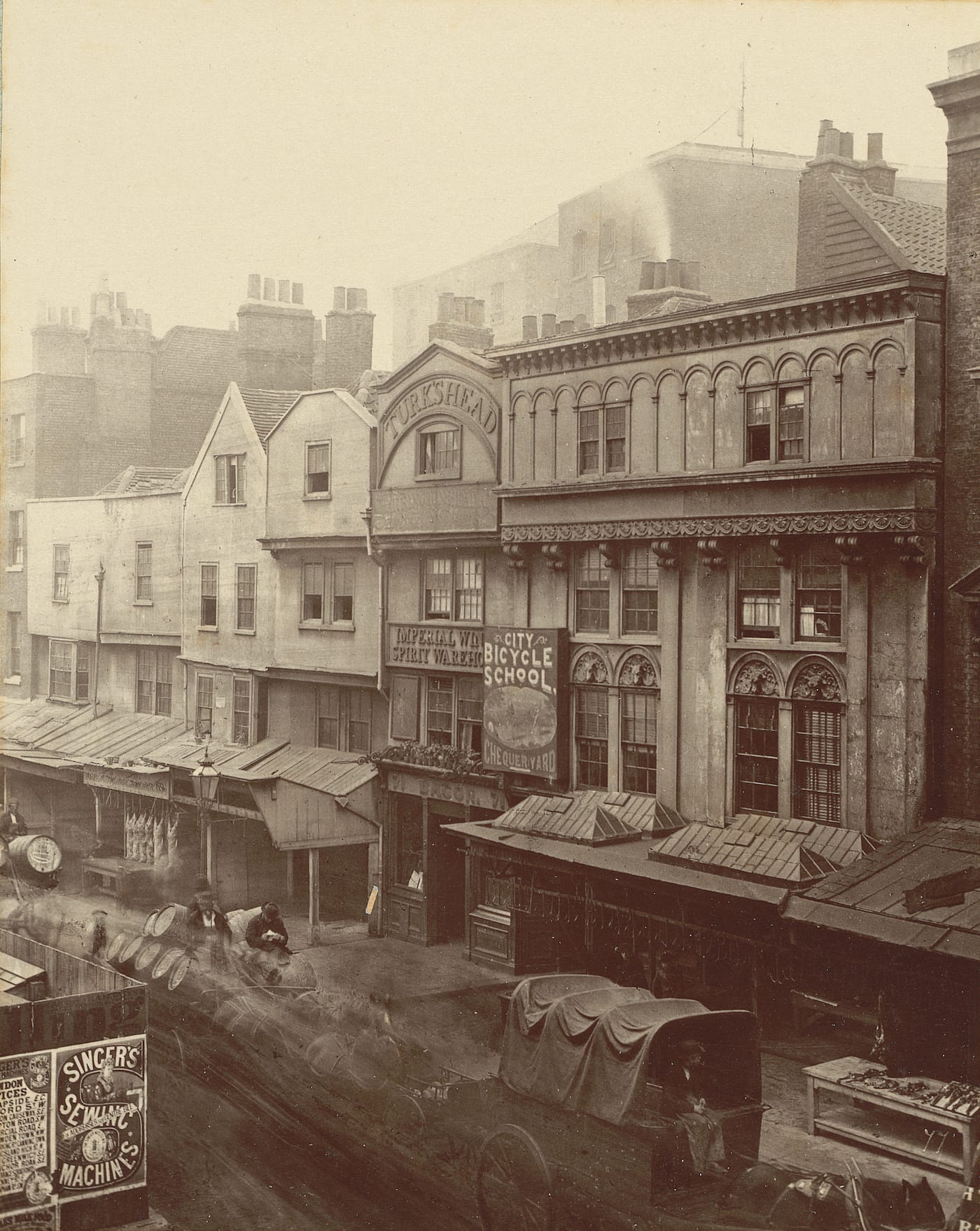 Henry and Thomas James Dixon, no. 77, "Old houses, Aldgate" (1883), carbon print mounted on card, from 'Relics of Old London' (Society for Photographing Relics of Old London, 1875–1886, courtesy Yale Center for British Art, Paul Mellon Collection)