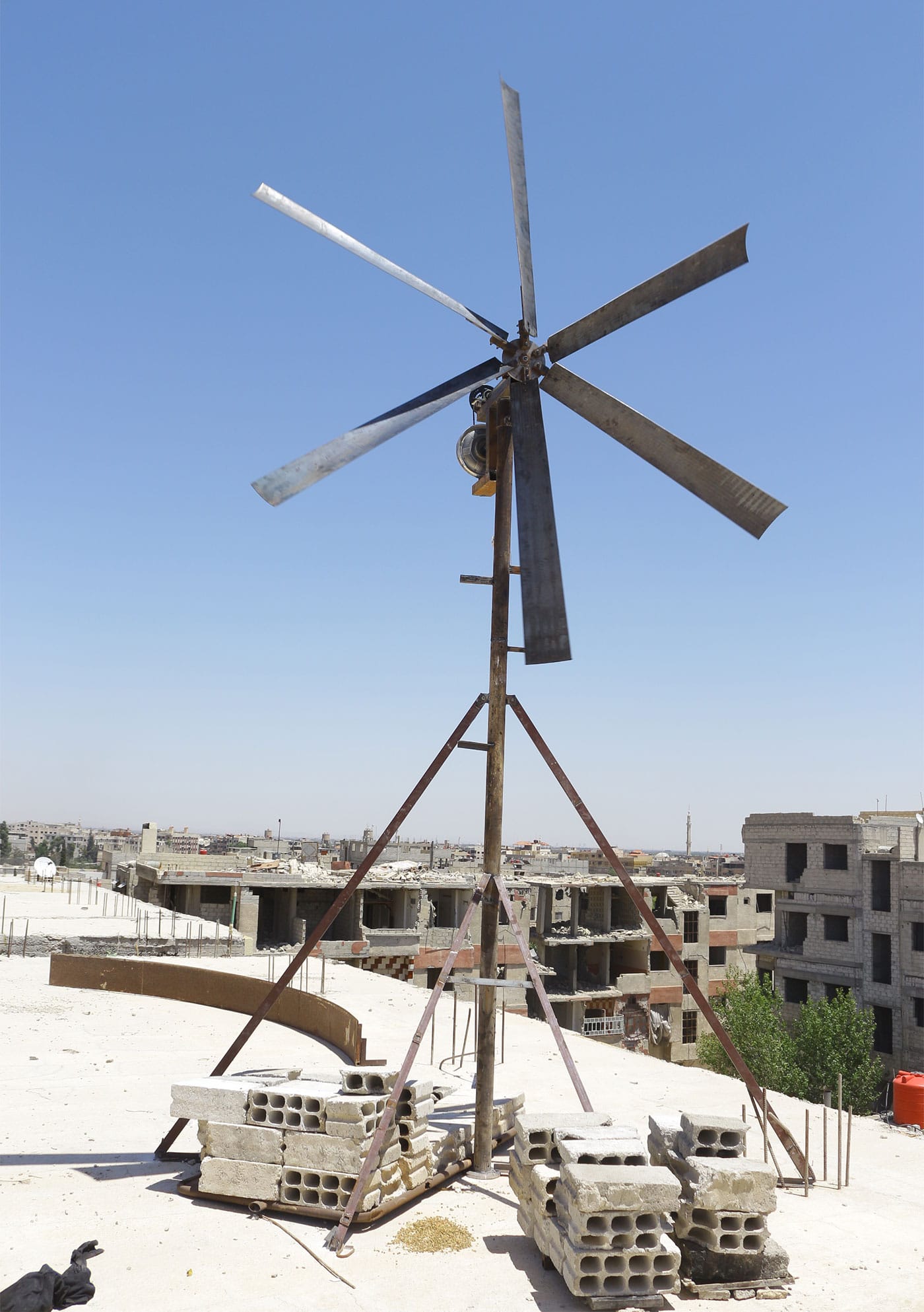 Khaled Malas' windmill in Ghouta, Syria. (photo by Yaseen al-Bushy, and courtesy the artist)