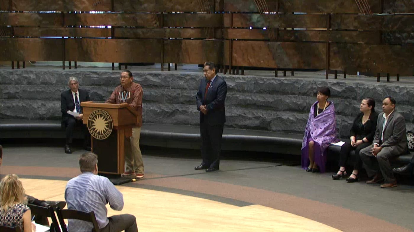 Governor Kurt Riley of the Pueblo of Acoma, with Conroy Chino, Traditional Leader of the Pueblo of Acoma, speaking at the emergency meeting (screenshot by the author for Hyperallergic)