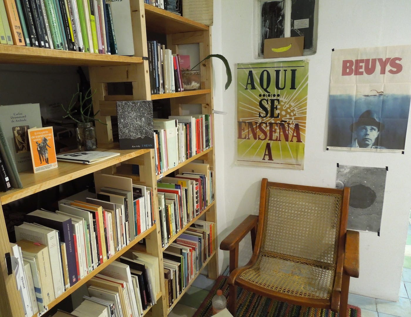 Bookshelves and posters at Aeromoto