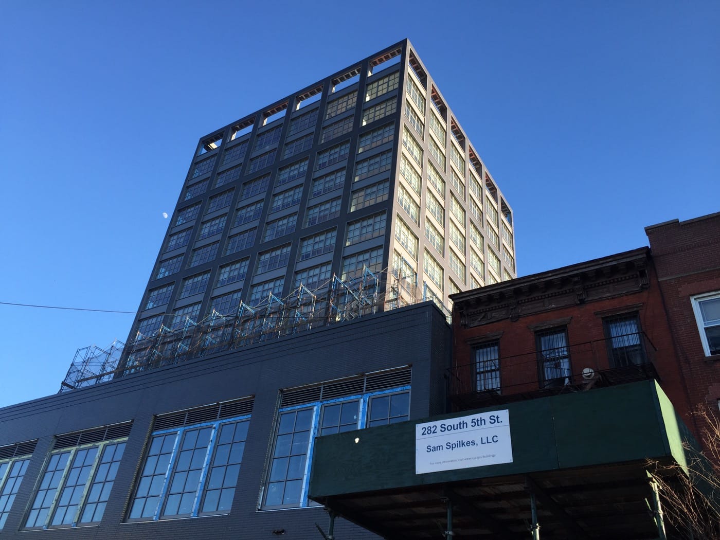 A new development on South 5th Street in Los Sures, 13 stories, 82 units. Photo by Caroline Bauer